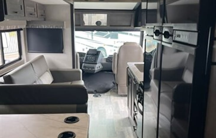 sofa, dinette and kitchen