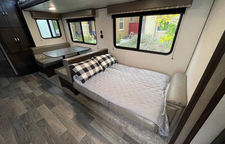 Easily fold down the couch to sleep two guests.