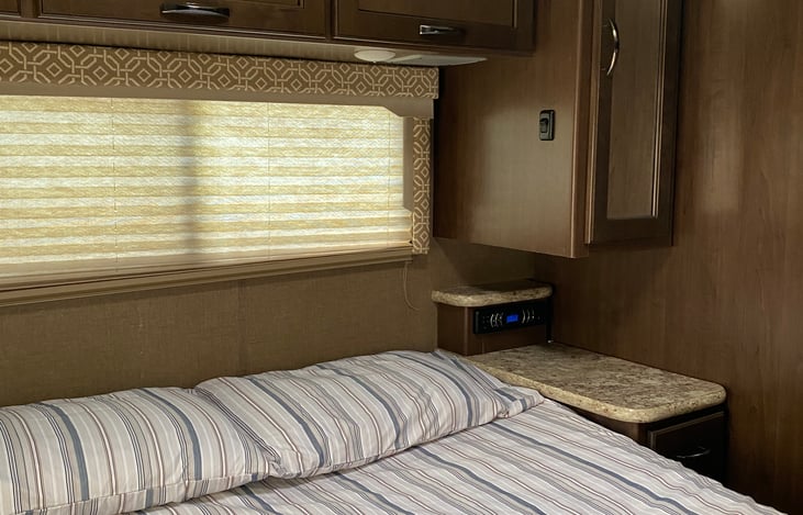 Master bedroom with night stands and audio system