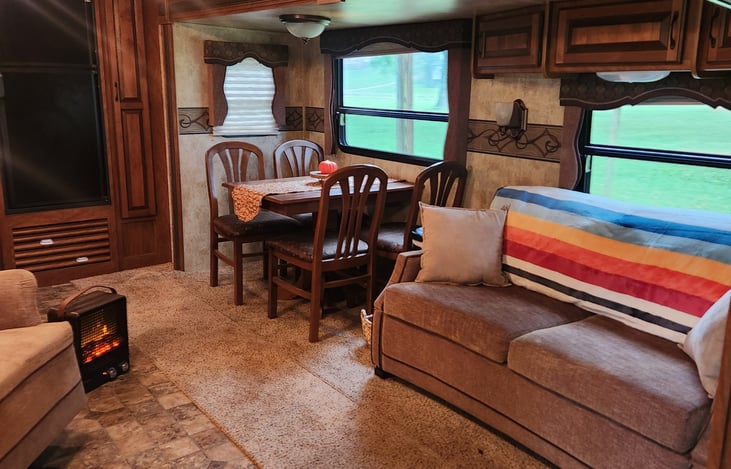 Sofa folds out with an air mattress.