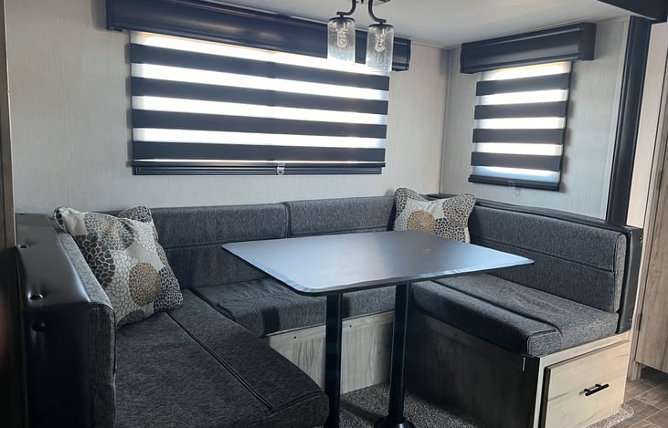 Zebra shades! These shades go from letting in Full light, to some light, to no light. Perfect for those late mornings sleeping in!