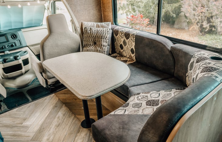 Spacious dinette converts into a bed.