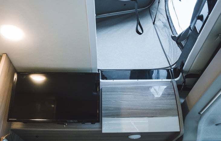 Grab a hold of that strap and give it a slight pull downward and just like that, your SkyBunk is closed and you're ready to roll.  Cant forget to mention the 24" TV w/ outdoor viewing capability too.