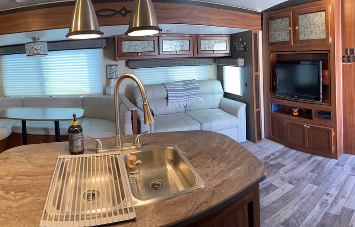 TV with Roku, DVD player and surround sound.