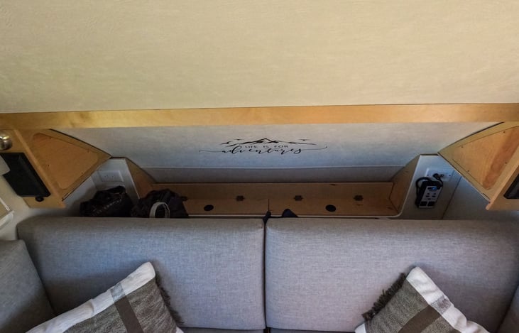 Outlet options available, and view of rear of trailer with linen stored behind the seats