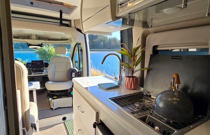Compact kitchen with a view of your choosing.