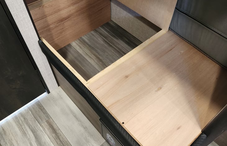 Storage under the lower bunk