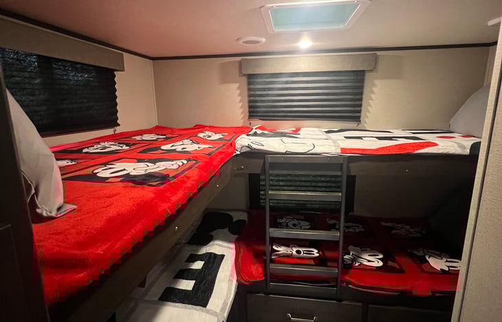 Back bedroom - 4 bunk beds and a TV