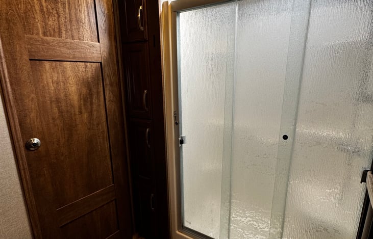 Two doors to the bathroom and nice full size shower.