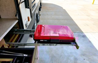 Large RV with outdoor kitchen, fireplace, and TVs