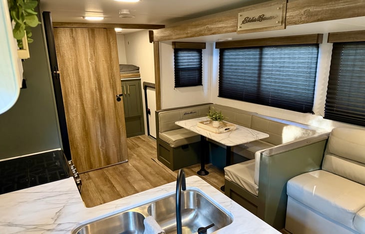 Welcome home! Dining seating for 4-6 that converts into a full bed.