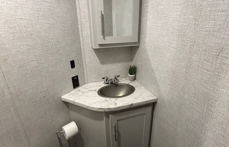 half bath in second rear bedroom