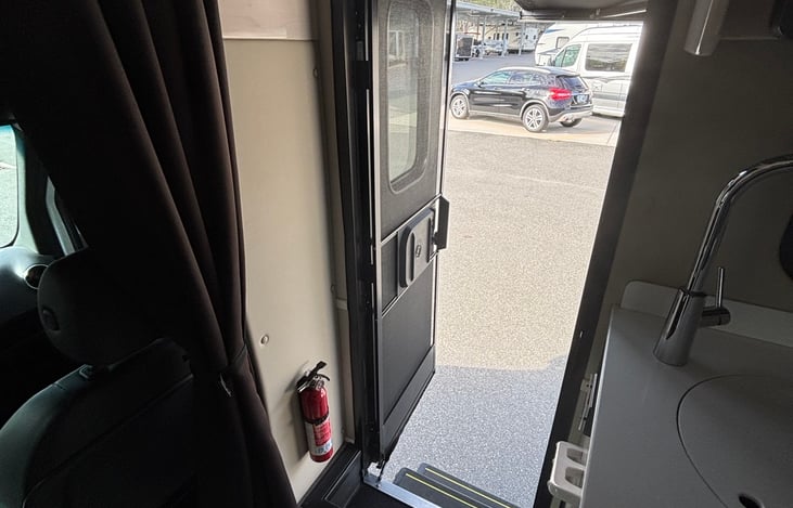 Side entrance and exit door w/screened door!