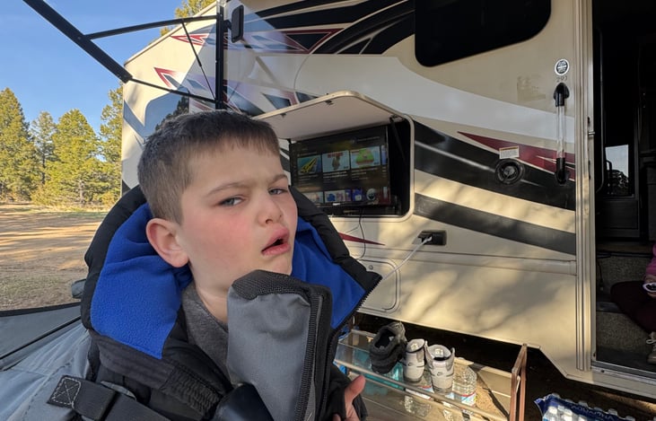 Brayden enjoying the outdoor entertainment system