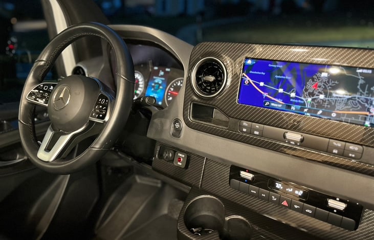 Touch screen MBUX panel gives full access to Trip, Navigation, Radio, Performance Info, Phone, and Settings. Display between Speedometer and Tach shows driver desired information.