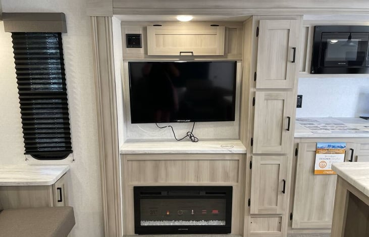 Smart TV and Electric Fireplace