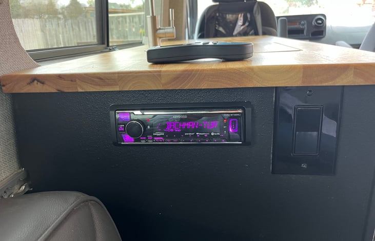 Blue tooth stereo, switch to turn off water pump - faucet works like any other but the switch keeps you from accidentally hitting the faucet valve and pouring water everywhere