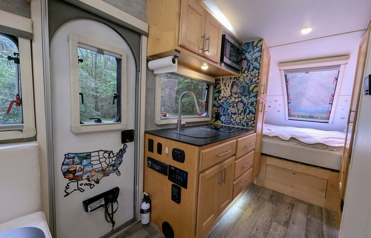 Solid cabinetry and pop-out windows throughout make this interior classy, bright and accommodating. Ample storage and everything you will need to enjoy your experience.