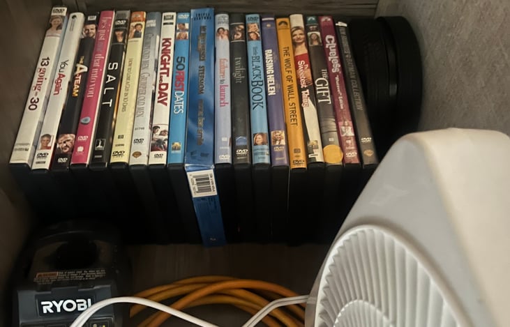 it is a Roku TV and does have Netflix, Disney HBO Max, and some other stuff if they let them stay logged in, can’t guarantee that, but if you don’t have a hotspot or access to Wi-Fi, there are  DVD’s