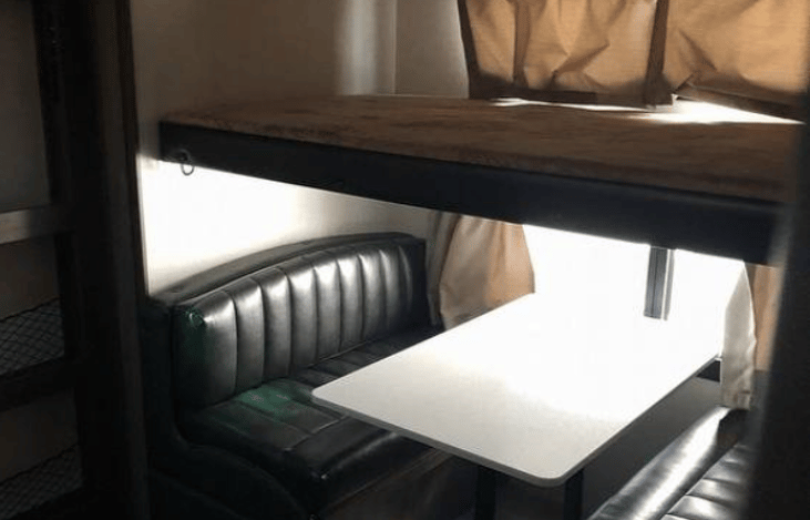 collapsible dinette in bunk room.