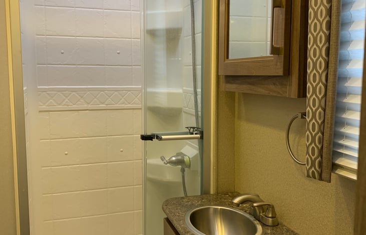 Full bath with toilet, sink & shower, towels included