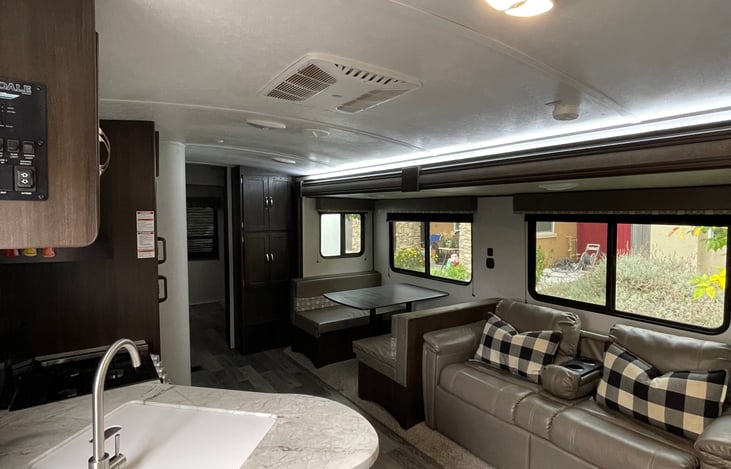 Step inside to a spacious kitchen/living area with plenty of seating.