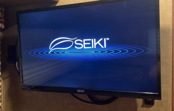 32 inch smart television in master bedroom.