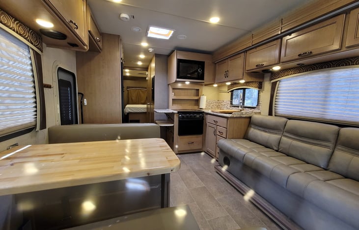 Open concept living area with perfect seating for game night