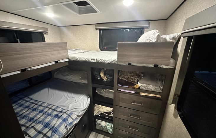 Bunk area with pocket door. This area can sleep 4.