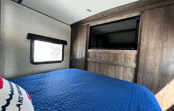 TV swivels from living room to master bedroom