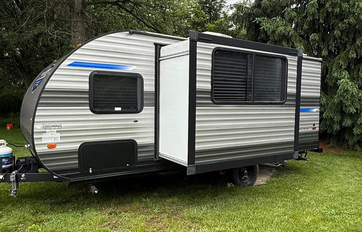 1 slideout on the driver's side, excellent storage underneath the sofa connects outside (to the left). You may find camping chairs, tools, and camping essentials in there.