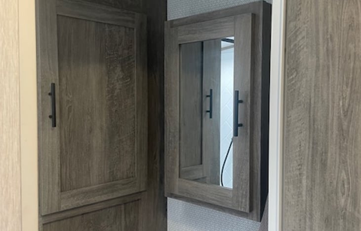 Spacious bathroom with lots of storage.