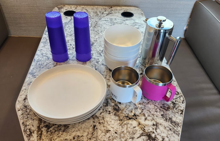 Kitchen flatware and coffee French press.