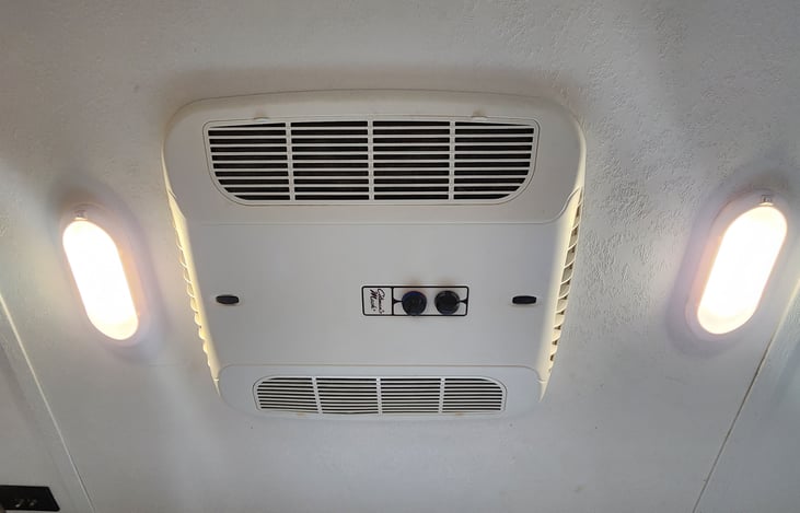 This is the AC/Fan for the camper. This is a large unit perfect for keeping the camper cool for hot summer days and nights.