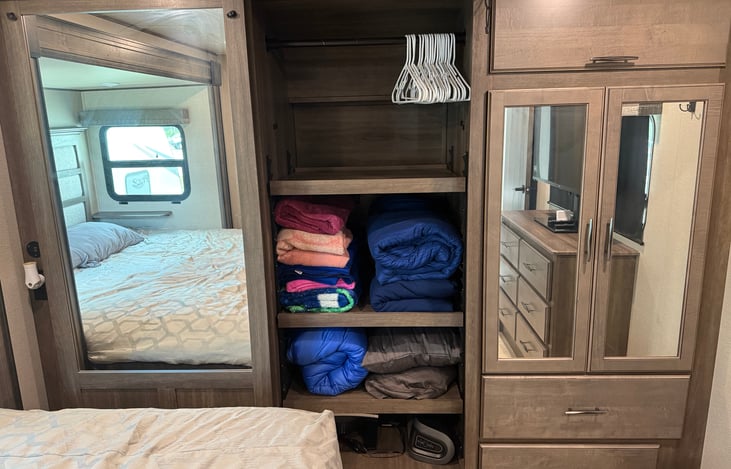 Additional throw blankets, comforters, sleeping bag, space heater and fan provided.