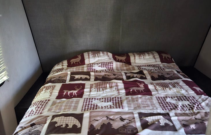 Standard Queen size bed in private room.