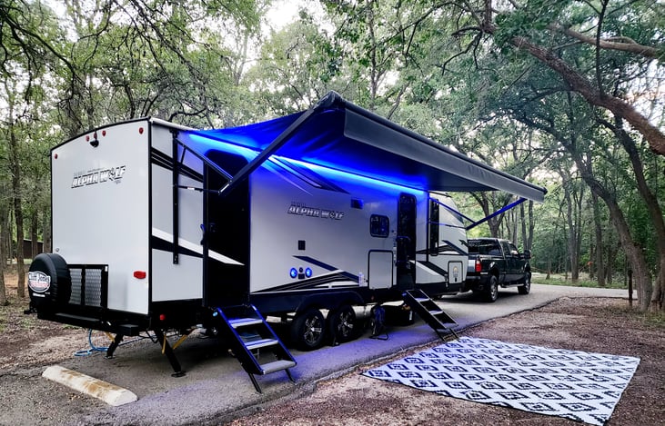 Outside has a 20ft power awning and we have a camping mat.