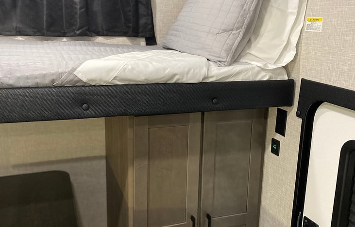 Spacious storage in second private living area/bunkhouse with emergency exit