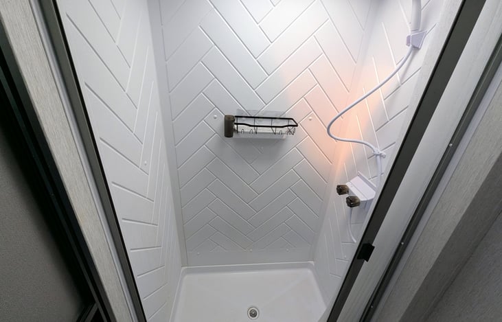 Spacious full bathroom has a separate entrance for convenience.