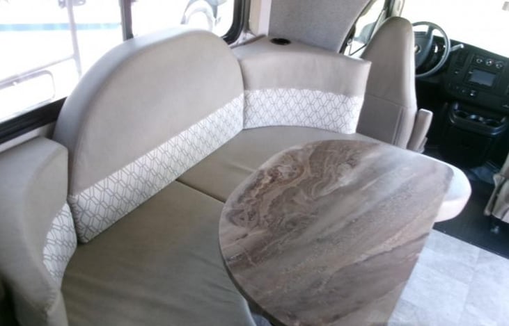 Dinette area turns to bed that sleeps 2.