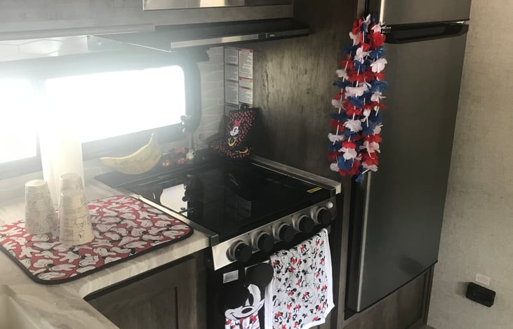 Microwave above stove.