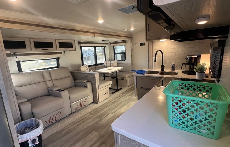View of the living room / kitchen from the main door