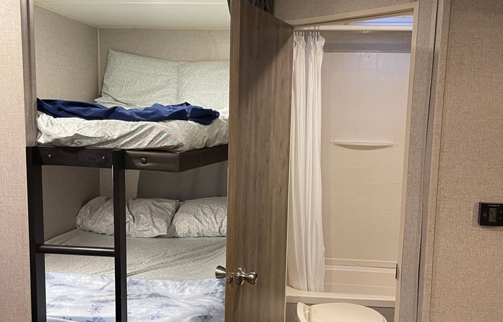 Bunks and bathroom
Both bunks include memory foam mattress toppers.