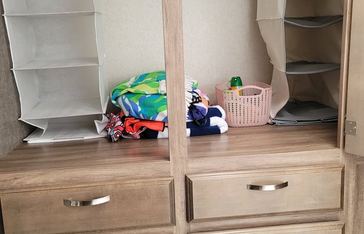 Very large bathroom cabinet and drawers.