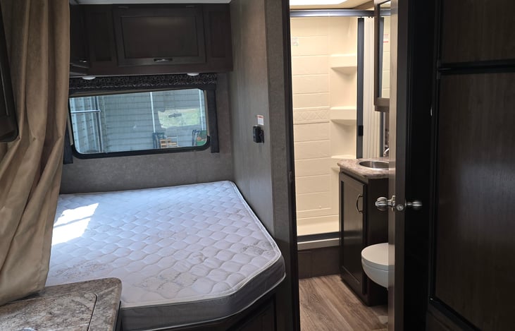 Main Queen Bed and Bathroom