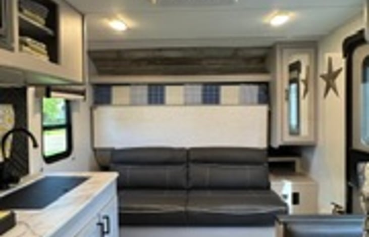 Sofa with bed stowed