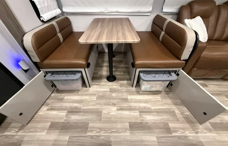 Storage under dinette. Extra Blankets and Comforters