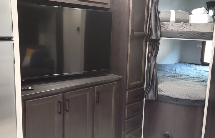 Entertainment area with DVD player and DVDs