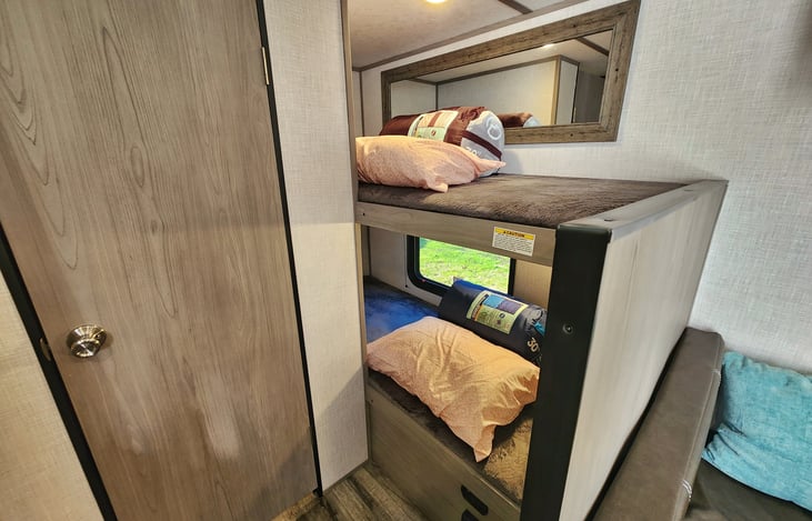 Bunks include laundered sleeping bags and pillow