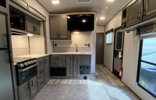 set up and deliver kid friendly toy hauler